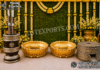 Luxury Haldi Ceremony Props For South Indian Weddings Golden lotus Haldi tubs with stools, Rolu-Rokali and Chakki props for a South Indian wedding ceremony.