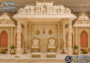 Premium Tirupati Theme Mandap for South Indian Weddings Premium Tirupati Theme Mandap for Grand South Indian Weddings Premium white and gold Tirupati temple theme wedding mandap with carved pillars, gopuram domes, Shankhu Chakra Namam backdrop and bride-groom chairs.